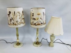 A GROUP OF THREE ONYX BASE TABLE LAMPS,