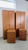PAIR OF OAK FINISH TWO DOOR WARDROBES AND A PAIR OF MATCHING THREE DRAWER BEDSIDE CHESTS.