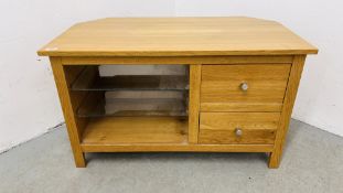A MODERN LIGHT OAK FINISH TWO DRAWER TELEVISION STAND WIDTH 97CM. DEPTH 53CM. HEIGHT 57CM.