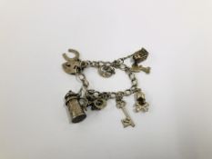 VINTAGE SILVER CHARM BRACELET AND VARIOUS CHARMS