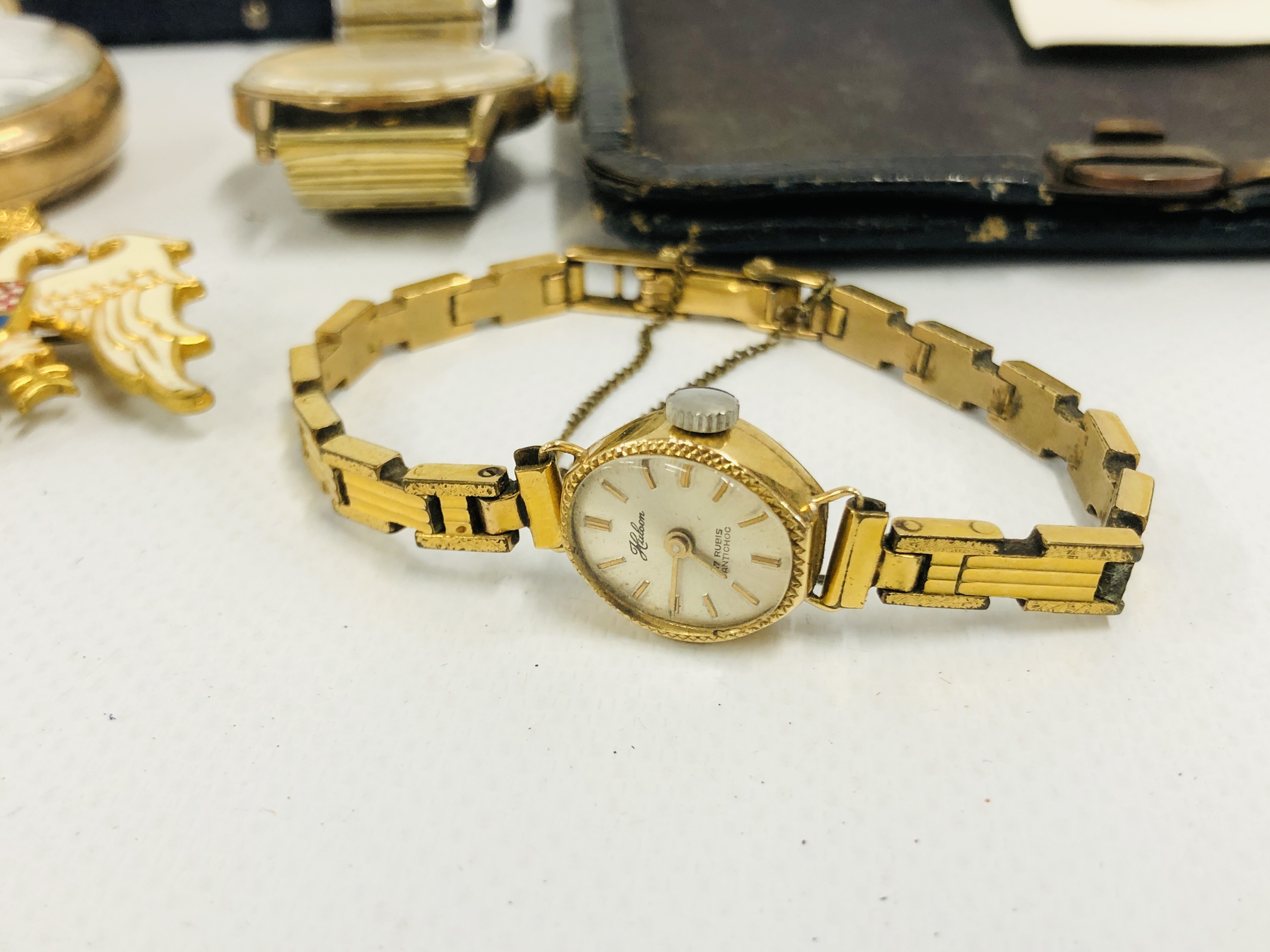 A LADY'S HULCOM 18CT GOLD CASED WATCH ON GOLD PLATED BRACELET, - Image 2 of 14