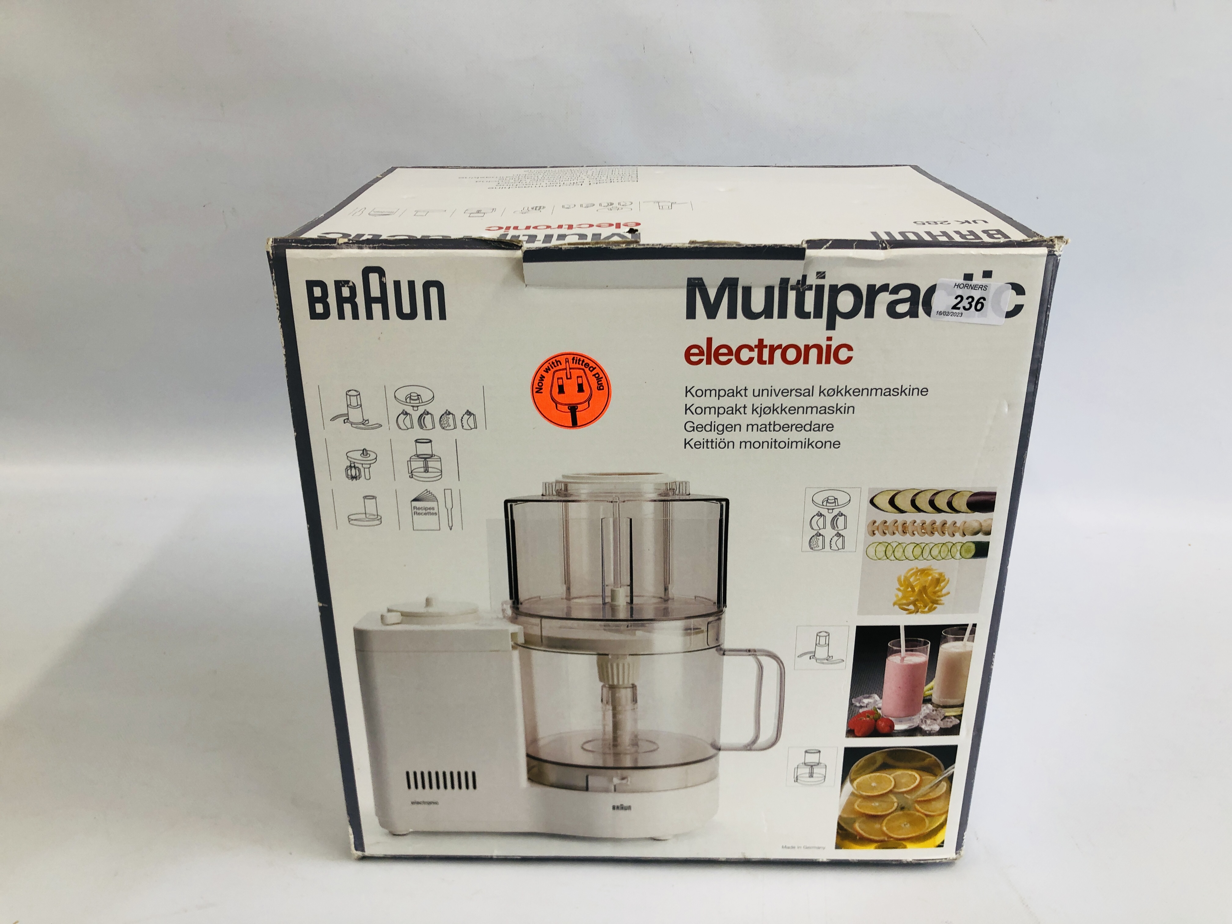 A BRAUN MULTIPRACTIC FOOD PROCESSOR ALONG WITH COOK BOOK - SOLD AS SEEN