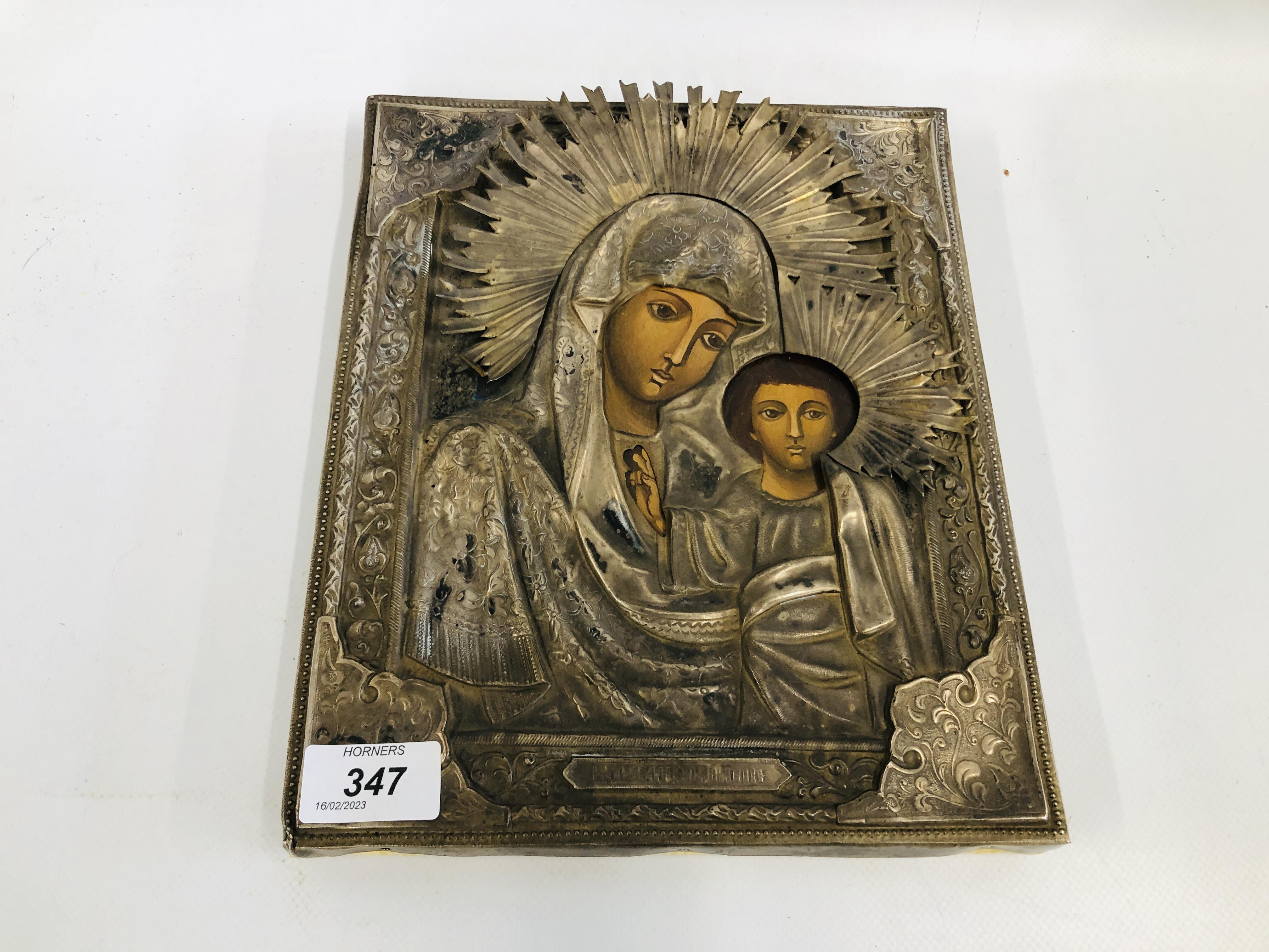 A RUSSIAN WHITE METAL ICON OF THE VIRGIN KAZAN.