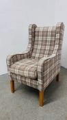 A MODERN CHECK UPHOLSTERED EASY CHAIR