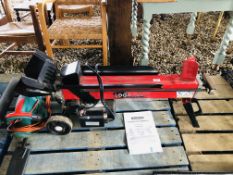 A LOGMASTER ELECTRIC HYDRAULIC LOG SPLITTER - SOLD AS SEEN.