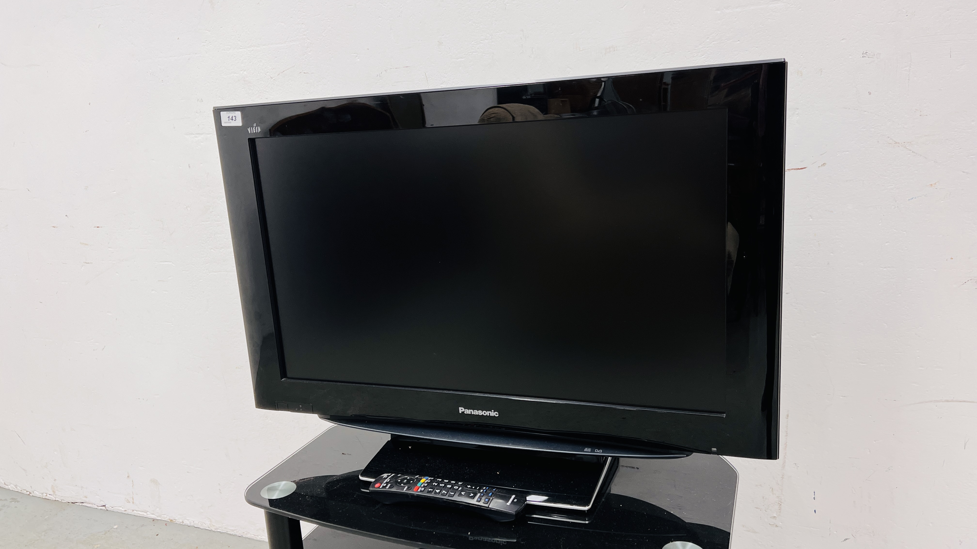 PANASONIC VIERA 32 INCH TELEVISION WITH REMOTE AND THREE TIER GLASS STAND. - SOLD AS SEEN. - Image 2 of 6