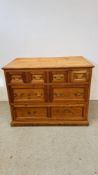 A VINTAGE PITCH PINE MULTI DRAWER CHEST W 111CM. D 70CM. H 87CM.