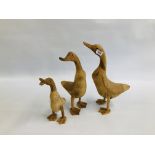 A SET OF 3 GRADUATED TREEN DUCK SCULPTURES (TALLEST H 46CM)