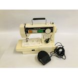 A TOYOTA ELECTRIC SEWING MACHINE MODEL 8001 COMPLETE WITH FOOT PEDAL AND INSTRUCTIONS - SOLD AS