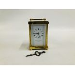 A VINTAGE BRASS SWISS CARRIAGE CLOCK BEARING MAKERS NAME "MATTHEW NORMAN" LONDON H 11CM.