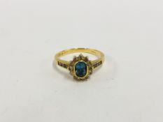 AN 18CT YELLOW GOLD BLUE TOPAZ AND DIAMOND SET RING,