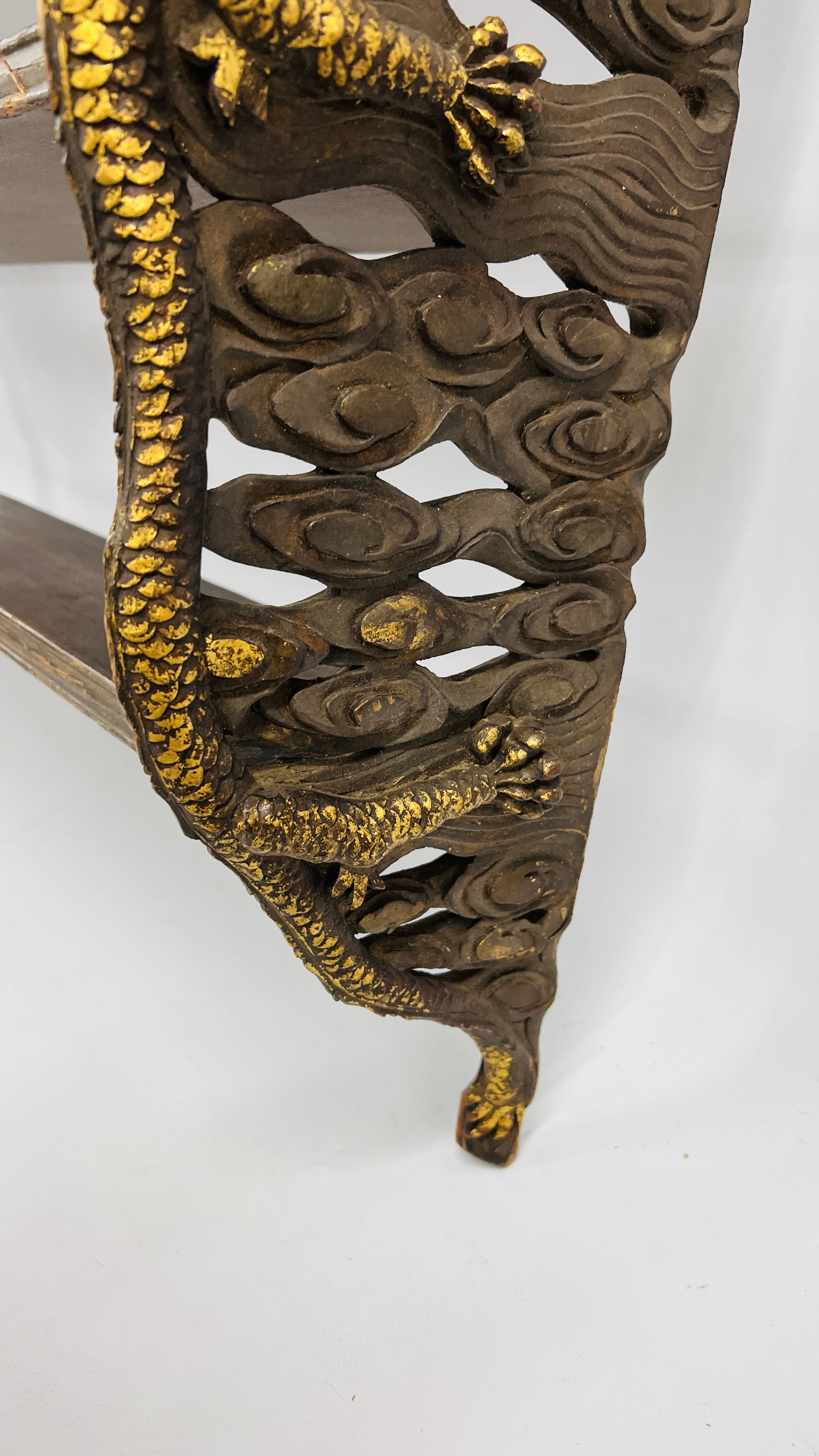 C20TH CHINESE STYLE THREE TIER BRACKET SHELF WITH DRAGON CARVED DETAIL - W 117CM. H 60CM. D 24CM. - Image 6 of 9