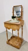 AN ANTIQUE PINE WASH STAND WITH MIRROR AND CREAM AND GREEN GLAZED JUG AND BOWL (BOWL HAVING RIM