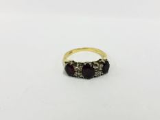 AN 18CT YELLOW GOLD RUBY AND DIAMOND SET DRESS RING,