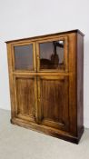 A MAHOGANY TWO DOOR CUPBOARD WITH GLAZED TWO DOOR CABINET ABOVE, W 112CM, D 33CM, H 131CM.