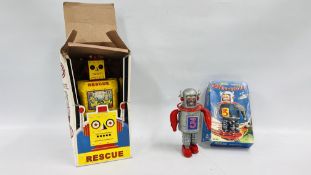 A BOXED WIND UP FRICTION POWERED ASTRO-SCOUT ALONG WITH BOXED "A TIN METAL ROBOT" RESCUE