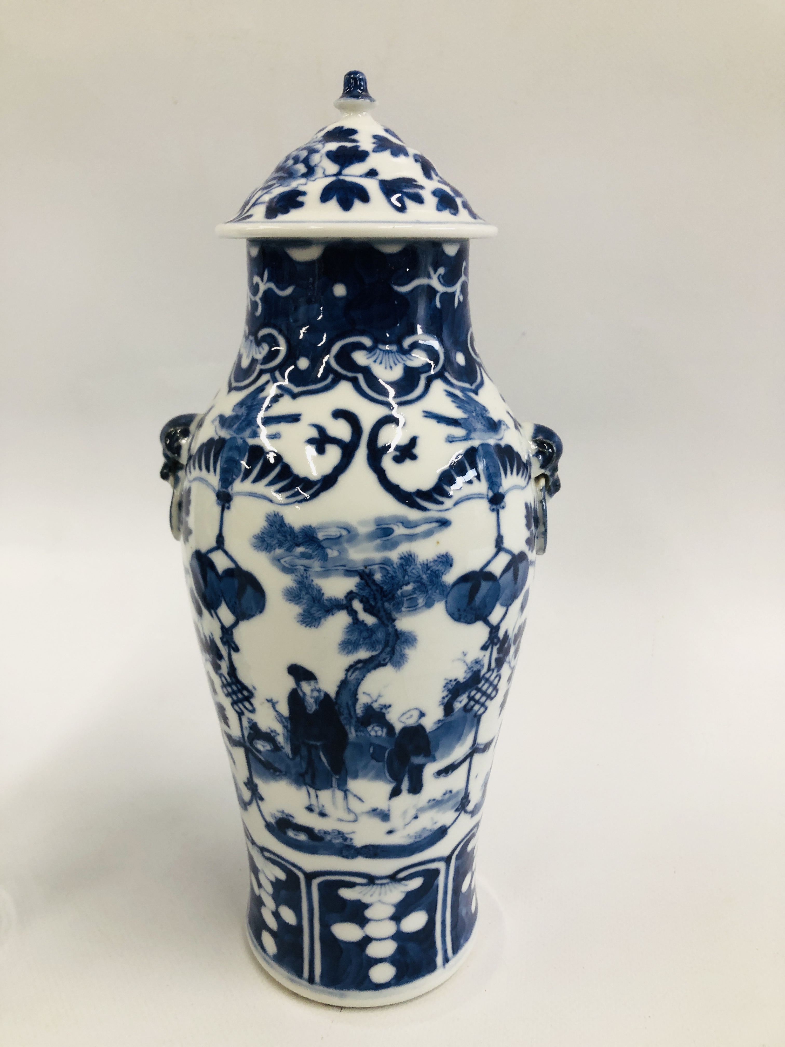 A PAIR OF ORIENTAL BLUE AND WHITE LIDDED URNS, DECORATED WITH FIGURES AND BLOSSOM, - Image 3 of 10