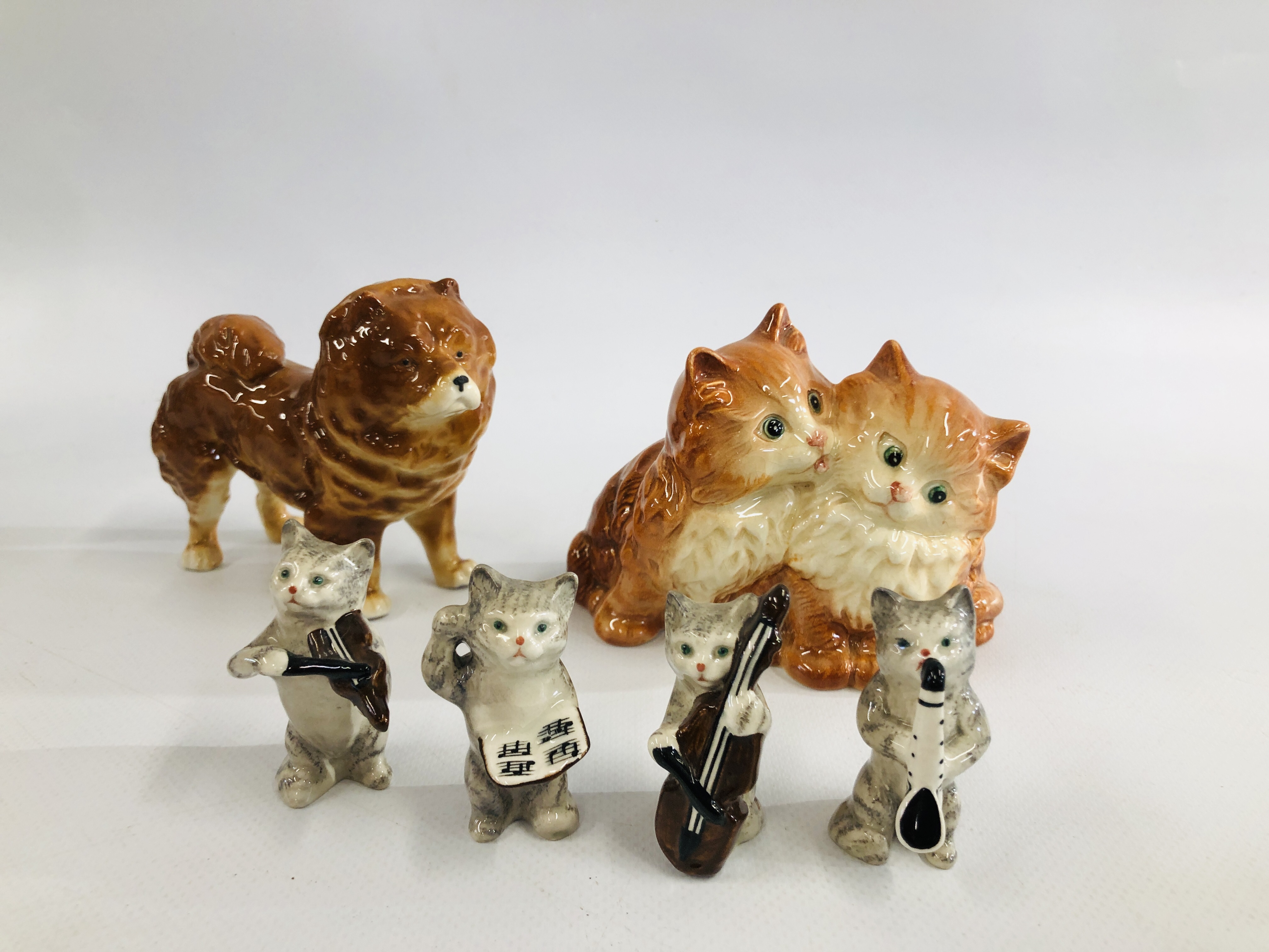 FOUR BESWICK "BANDSMEN" CATS AND BESWICK GINGER CAT ORNAMENT AND CHOW-CHOW DOG ORNAMENT