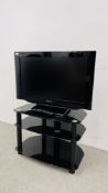 PANASONIC VIERA 32 INCH TELEVISION WITH REMOTE AND THREE TIER GLASS STAND. - SOLD AS SEEN.