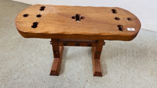 A HANDCRAFTED MAHOGANY STOOL WITH PIERCED DECORATION, LENGTH 73CM, HEIGHT 42CM.