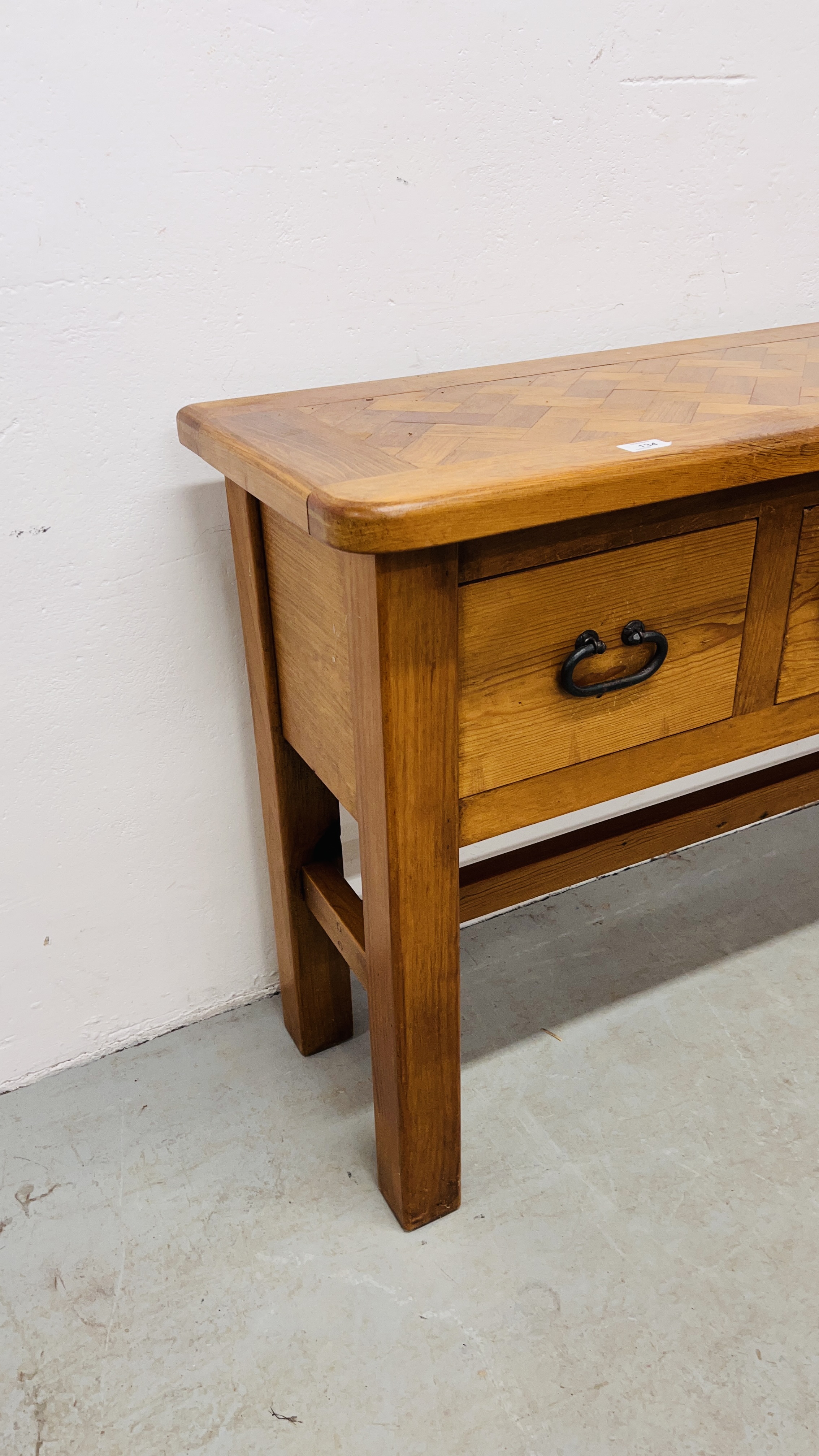 A SOLID BEECHWOOD AND PINE THREE DRAWER SIDE TABLE WITH RUSTIC IRON CRAFT HANDLES AND PARQUET - Image 4 of 12