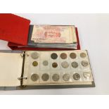 TWO ALBUMS CONTAINING A QUANTITY OF COINAGE AND BANK NOTES.
