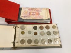 TWO ALBUMS CONTAINING A QUANTITY OF COINAGE AND BANK NOTES.
