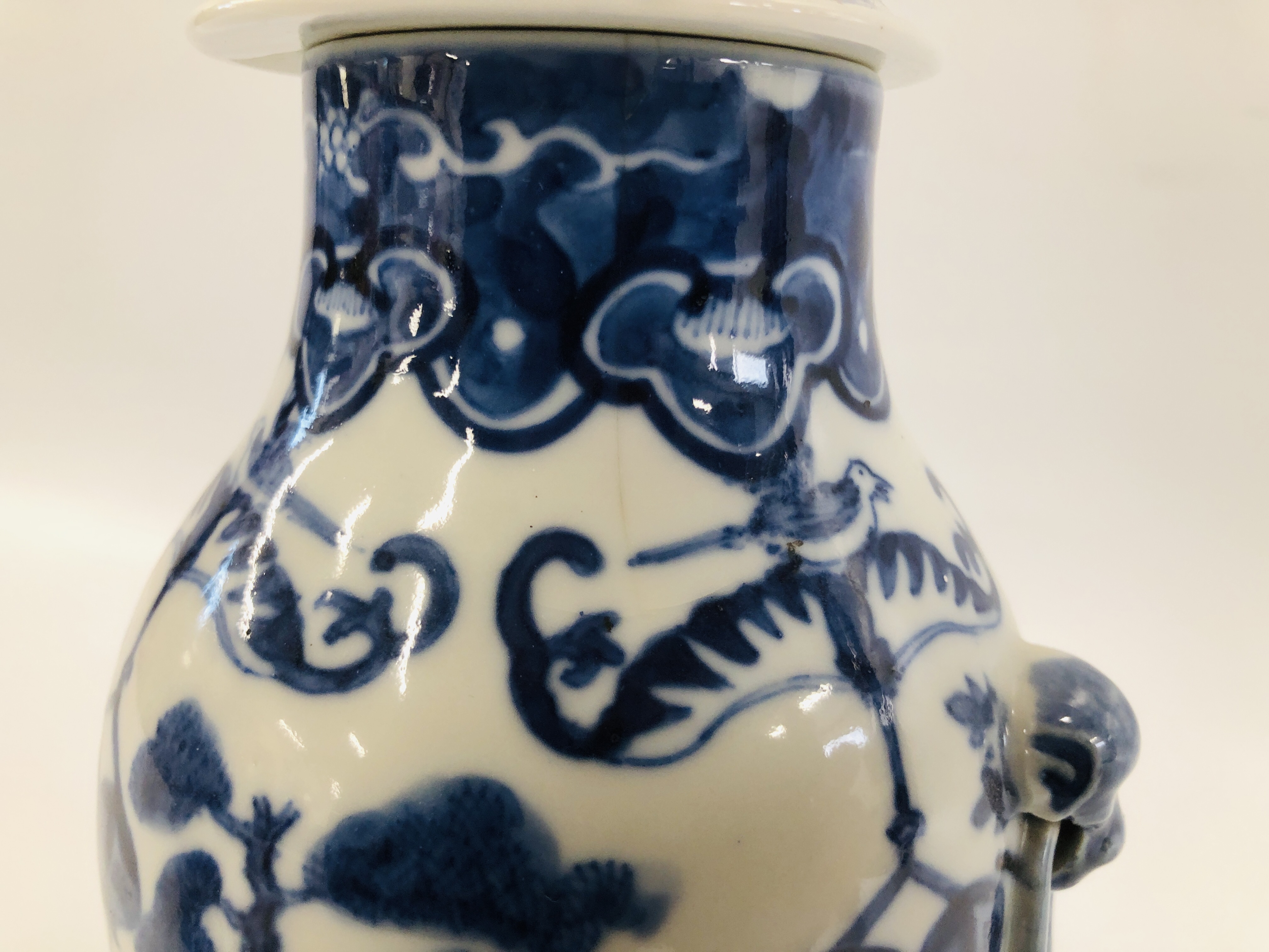A PAIR OF ORIENTAL BLUE AND WHITE LIDDED URNS, DECORATED WITH FIGURES AND BLOSSOM, - Image 8 of 10