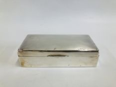 A VINTAGE SILVER CIGARETTE BOX - L 18CM. X D 8.5CM. X H 4.7CM.