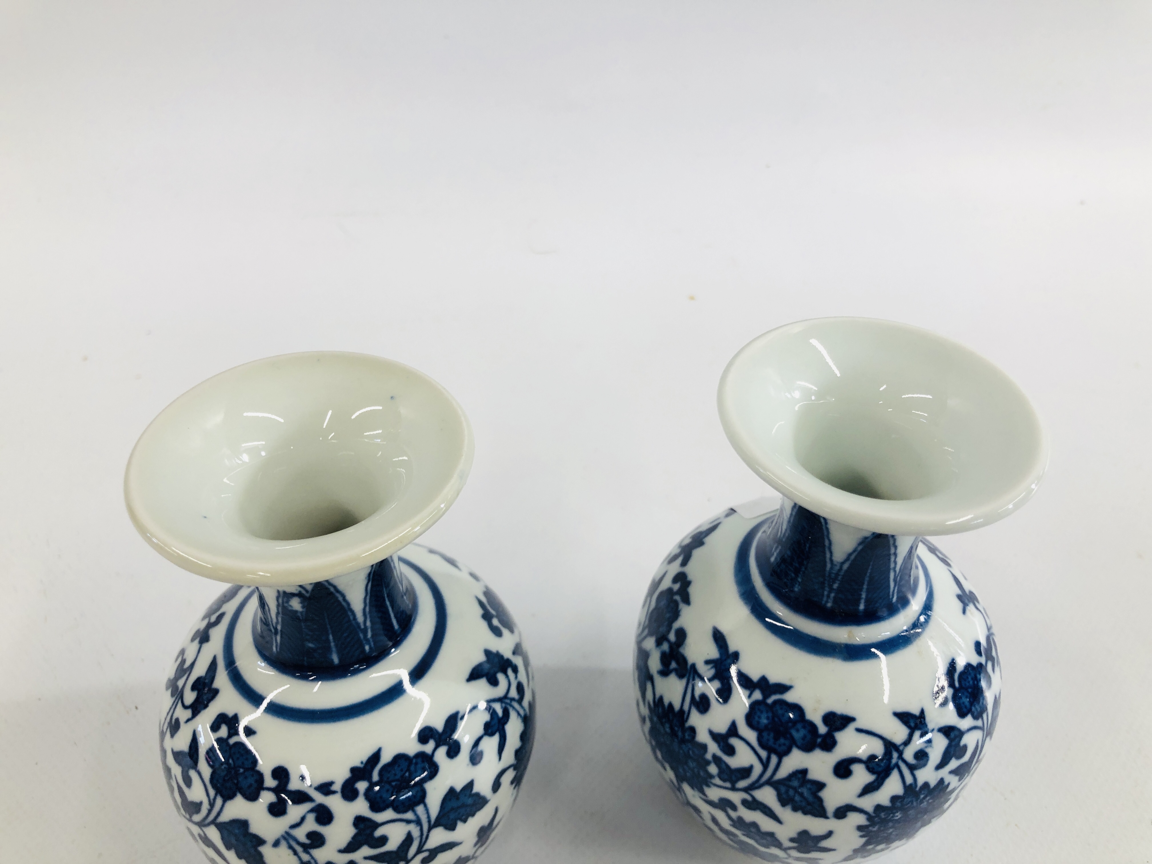 A PAIR OF CHINESE BLUE AND WHITE VASES OF BALUSTER FORM WITH FLARED RIMS BEARING "KANXI" SEAL MARK, - Image 2 of 5