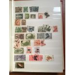 BOX STAMP COLLECTIONS IN FOURTEEN VARIOUS VOLUMES.