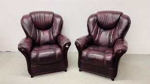 A PAIR OF BURGANDY LEATHER EASY CHAIRS