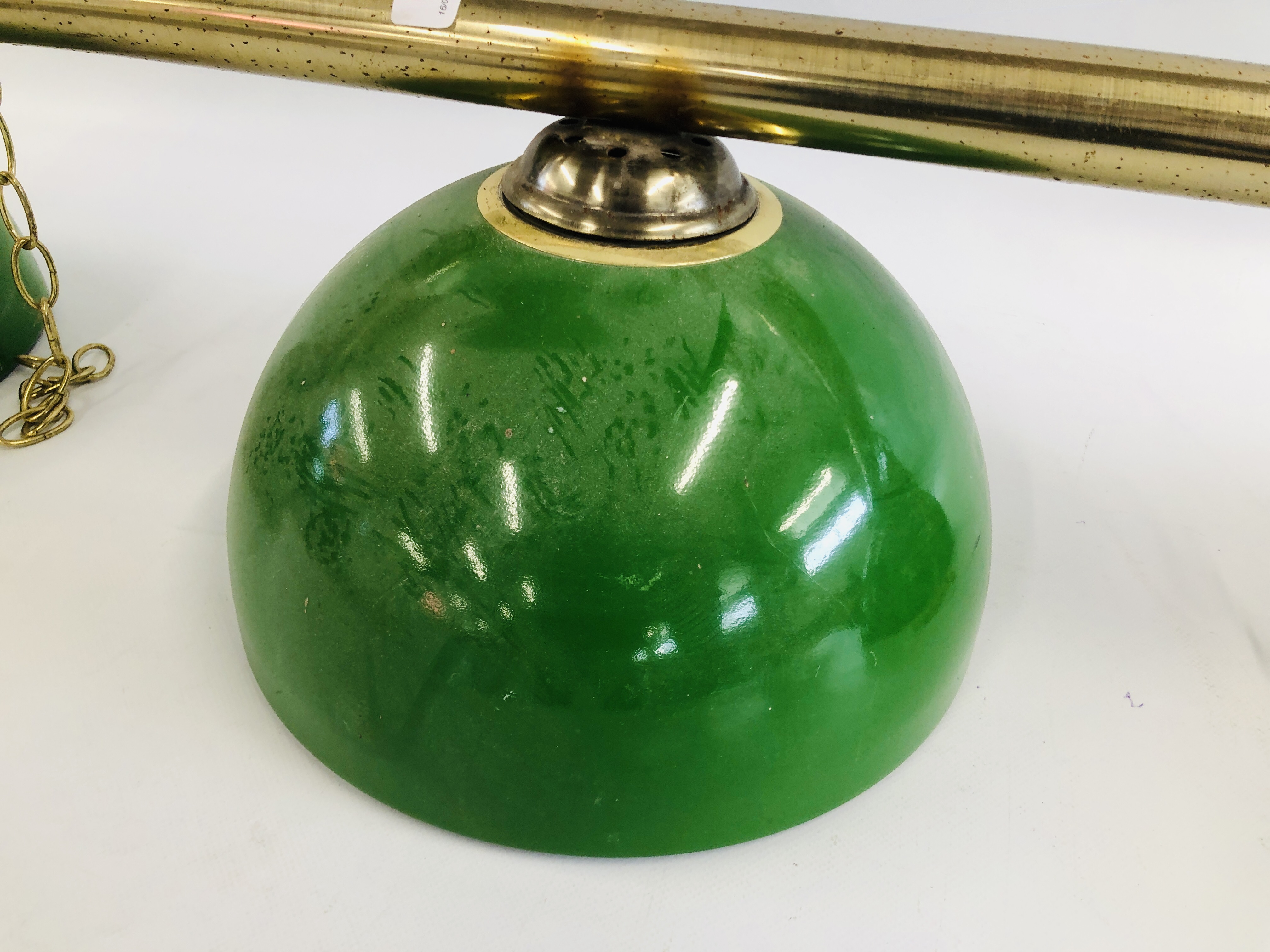 A VINTAGE STYLE CEILING SUSPENDED THREE BULB LIGHT BAR ON BRASS EFFECT TUBE AND GREEN SHADES - SOLD - Image 4 of 5