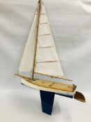 A HANDCRAFTED MODEL YACHT.