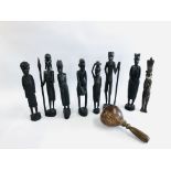 A COLLECTION OF 7 ETHNIC HARDWOOD FIGURES + ONE OTHER AND A COCONUT SHAKER.