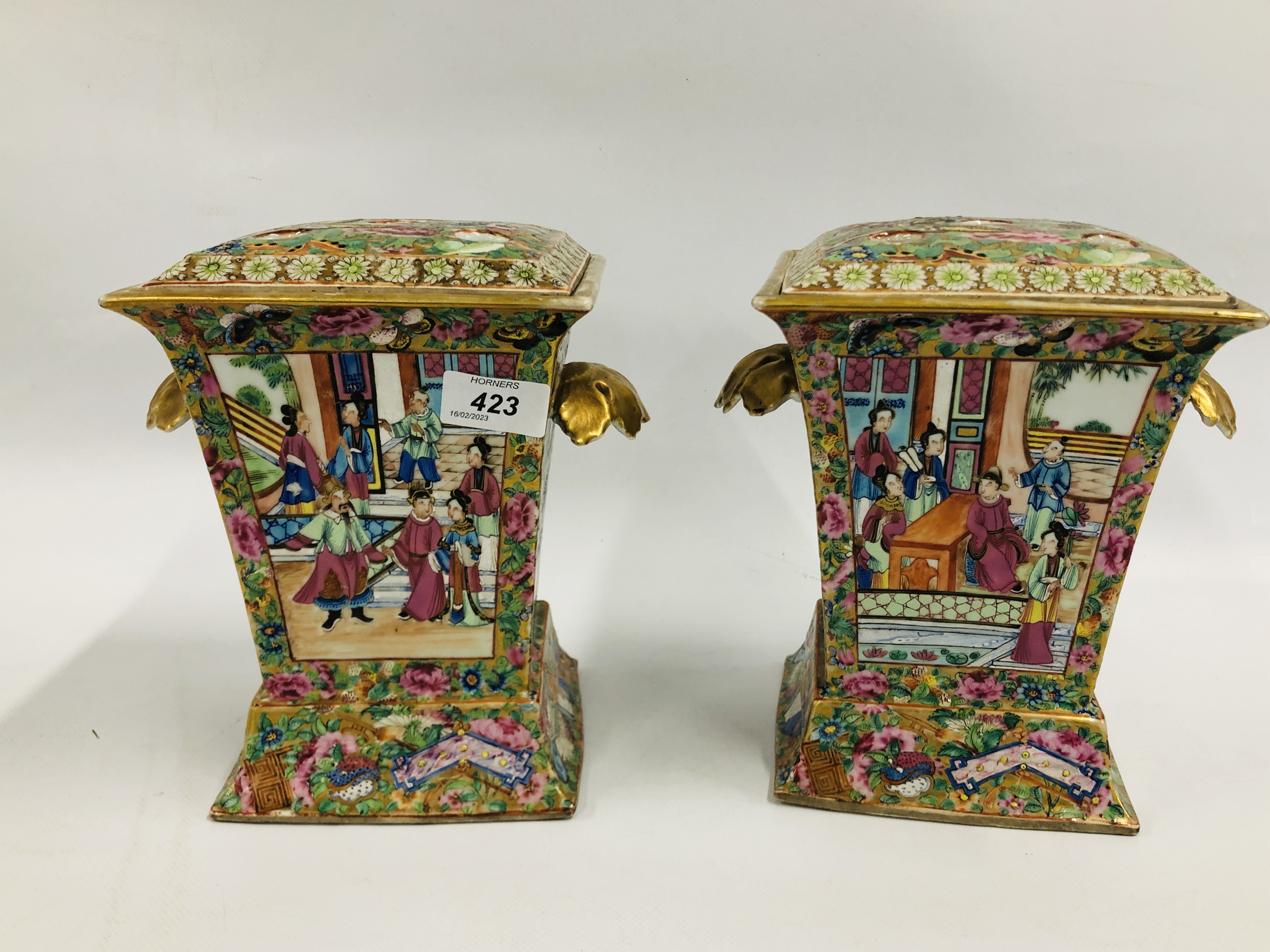 A PAIR OF CANTONESE FAMILLLE ROSE TULIP VASES OF SQUARE TAPERED FORM.