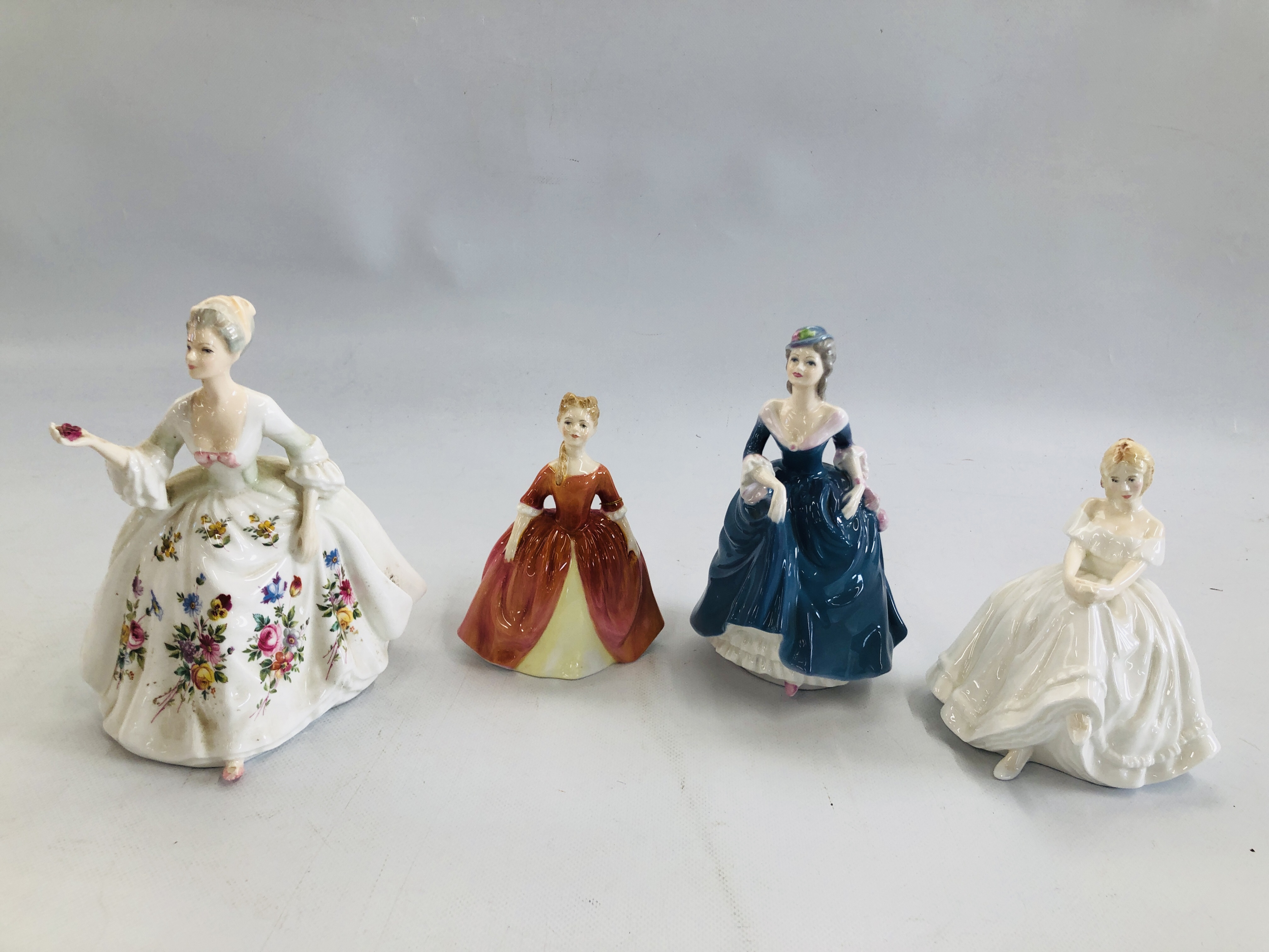 A GROUP OF THREE ROYAL DOULTON FIGURINES TO INCLUDE HEATHER HN 2956, DIANA HN 2468,