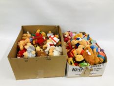 AN EXTENSIVE COLLECTION OF WINNIE THE POOH SOFT TOYS IN VARIOUS OUTFITS - APPROX 60 (IN TWO BOXES)