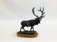 REPRODUCTION CAST METAL STAG ON WOODEN BASE, H 48.5CM X L 37CM.