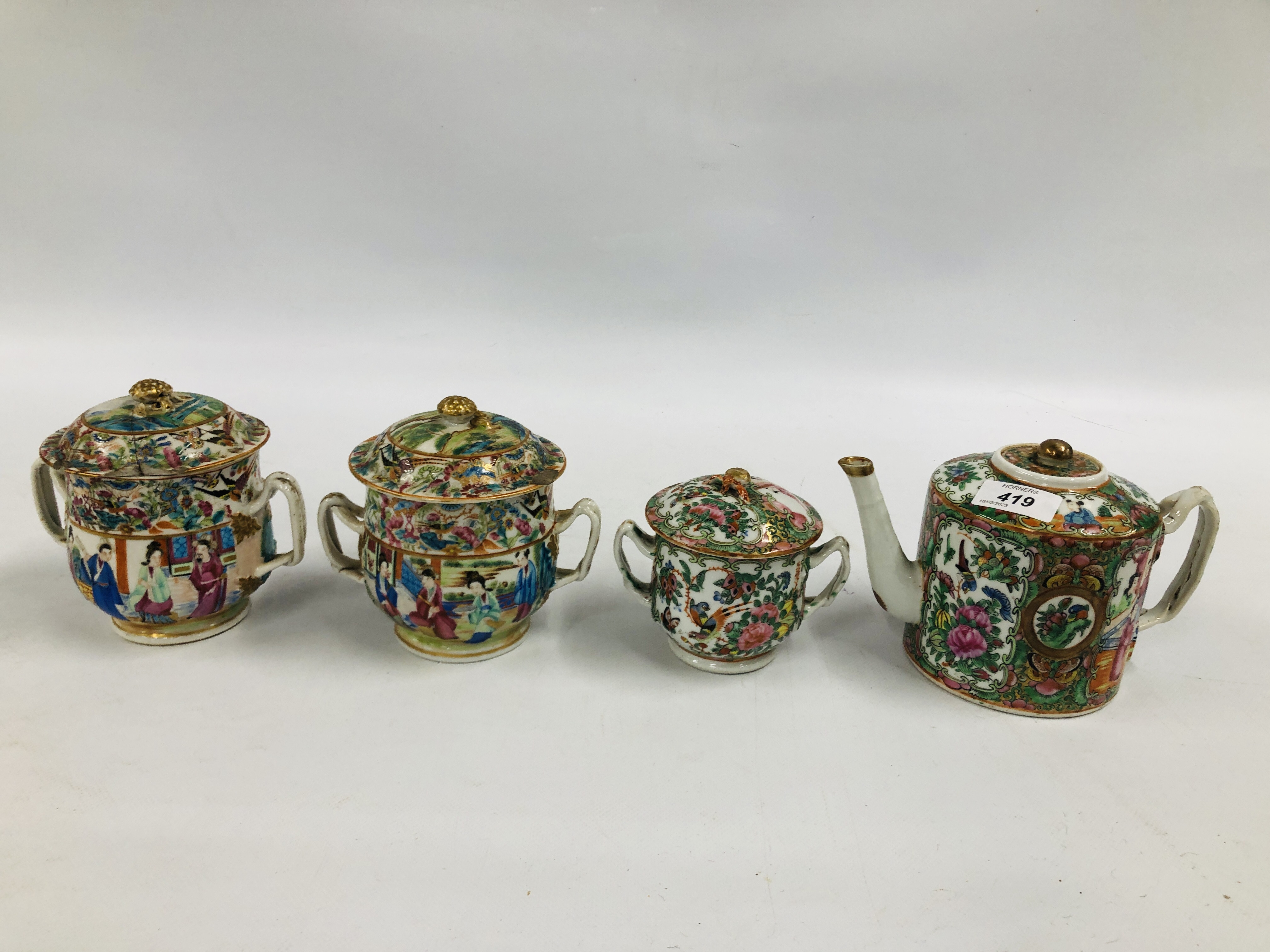 CANTONESE TEAPOT AND COVER ALONG WITH A SUGAR BASIN AND COVER AND A PAIR OF TWO HANDLED BOWLS AND