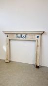 A WHITE PAINTED ANTIQUE FIRE SURROUND - OPENING WIDTH 105M. HEIGHT 93CM.