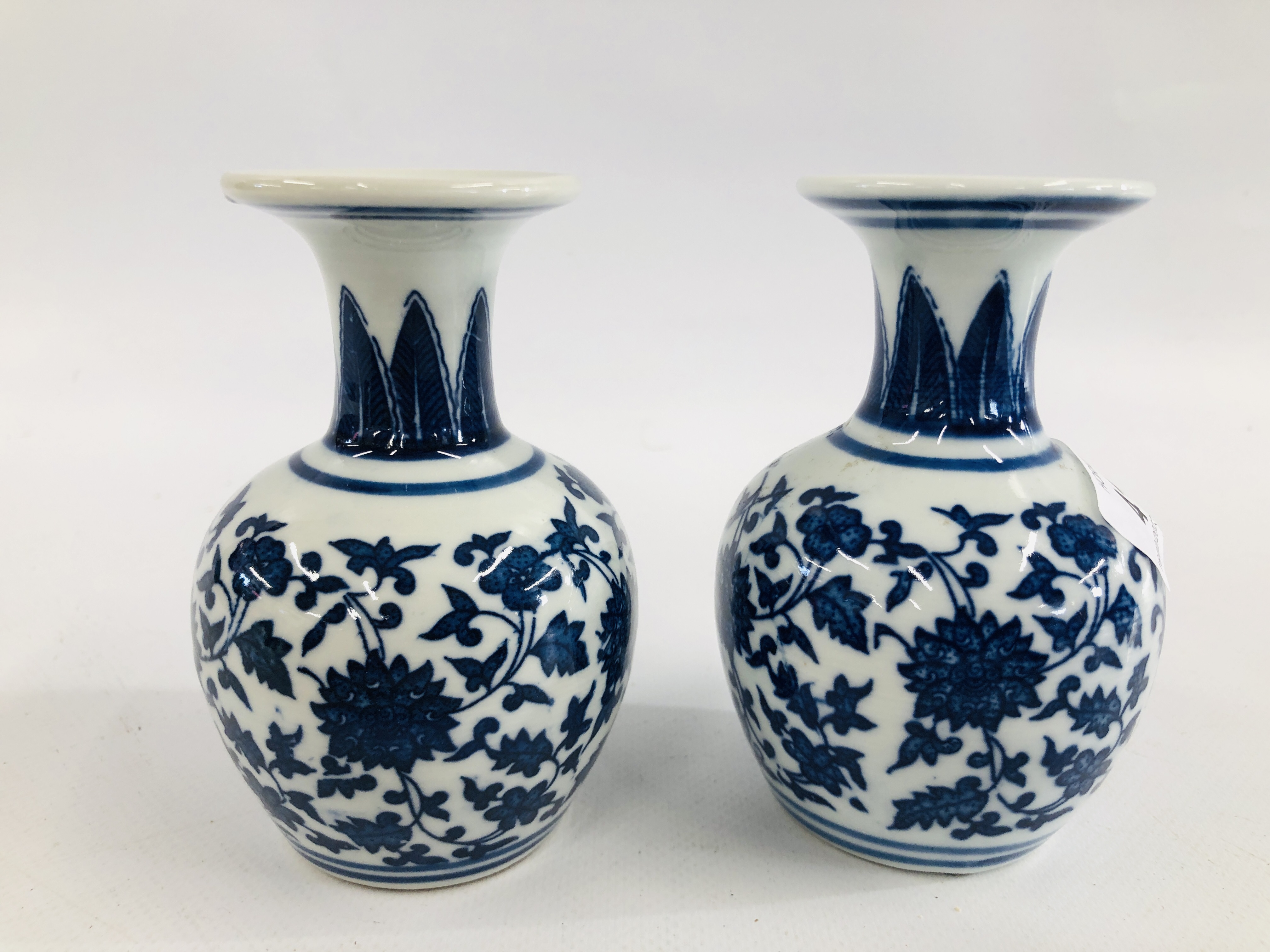 A PAIR OF CHINESE BLUE AND WHITE VASES OF BALUSTER FORM WITH FLARED RIMS BEARING "KANXI" SEAL MARK, - Image 3 of 5