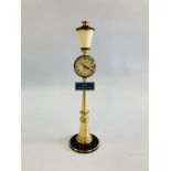 A VINTAGE "RUE DE LA PAIX" BRASS LAMP POST CLOCK MARKED "JAEGER" H 28CM.