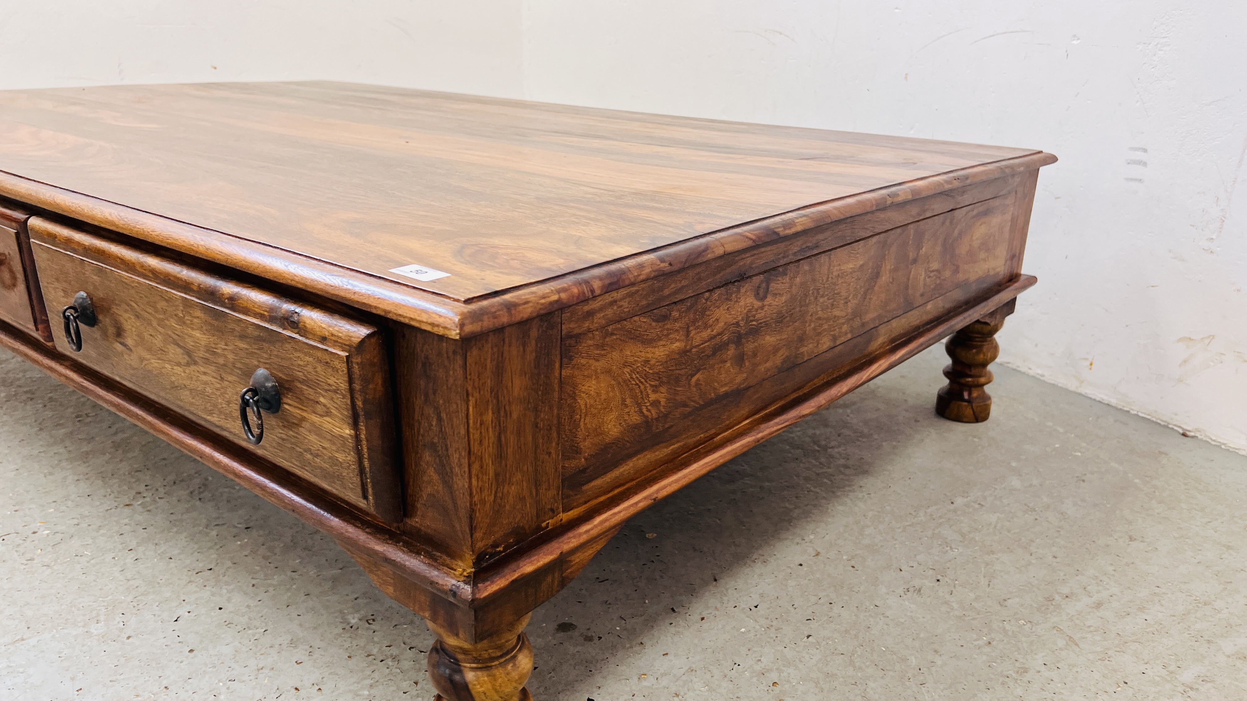 A MODERN ORIENTAL HARDWOOD COFFEE TABLE WITH FRIEZE DRAWERS 181CM. LONG. - Image 5 of 15