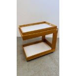 A BEECH WOOD DRINKS TROLLEY WITH UNDER TIER.