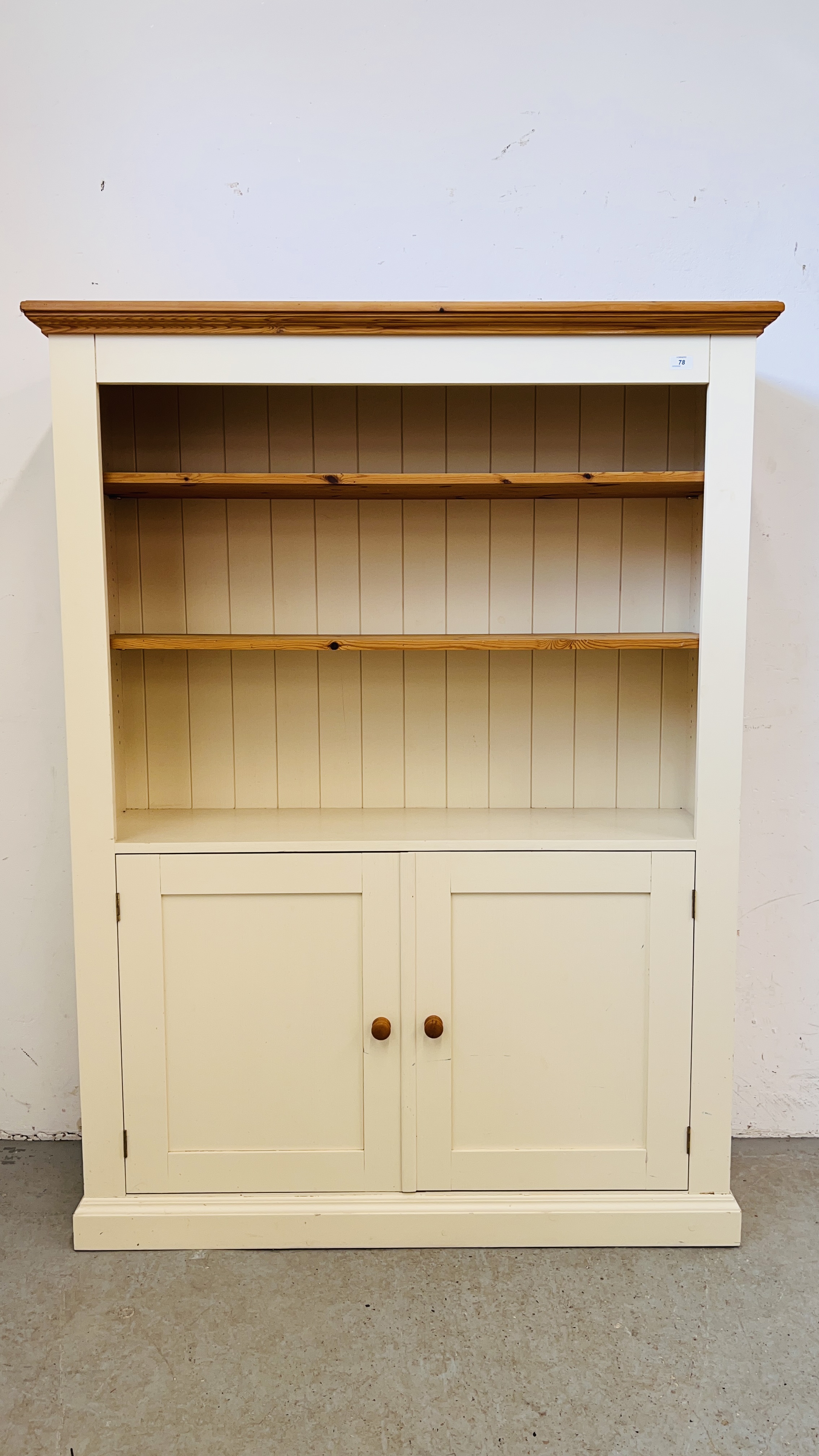 A MODERN OPEN BOOKCASE WITH DOUBLE CUPBOARD BELOW, W X 127CM. X D 38CM. X H 169CM.