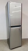 A INDISIT SILVER FINISH FRIDGE FREEZER - SOLD AS SEEN.