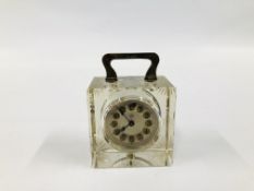 A VINTAGE GLASS CUBE CLOCK WITH SILVER HANDLE, LONDON ASSAY BEARING MAKERS MARK "JUNGHANS" H 7.