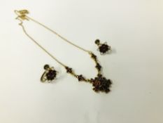 A YELLOW METAL GARNET SET PENDANT NECKLACE ALONG WITH A PAIR OF SIMILAR SCREW ON GARNET AND PEARL