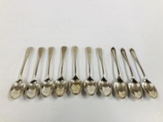 SET OF SIX SILVER TEASPOONS, ENGRAVED WITH CROSSED GOLF STICKS AND BALL,